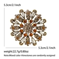 Vintage sunburst alloy brooch with amber crystals and rhinestones, 5.3cm diameter - Brown