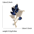Elegant gold orchid flower brooch with blue crystals and white rhinestones, 5.8cm size - Gold