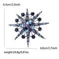 Broche étoile à huit branches avec strass bleus et violets sur base argent - Bleu
