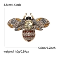 Vintage alloy bee brooch with colorful rhinestones on a white background, 5.6cm wide - Champagne Style