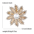 Golden snowflake brooch with white pearl and rhinestones, size 5.4cm by 5.1cm - Gold