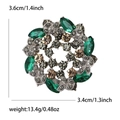 Vintage silver alloy brooch with emerald green crystals and champagne rhinestones - Green