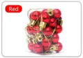 Close-up of 24 red Christmas balls with gold strings in a clear rectangular plastic box - 2cm 24 Pieces/Pack / Red