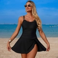 Detail of black one-piece swimsuit featuring wavy neckline and side-tie ruffled skirt - S / Black