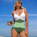 Detail of color-block one-piece swimsuit with V-neckline and olive green waist wrap design - S / Green Patchwork