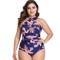 Detail of floral one-piece swimsuit featuring a crossover halter neck and waist ruching - XL / Blue Leaves Print