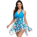 Detail of plus size halter swimdress with blue bow and tropical floral mesh skirt - S / Top And Bottom / Blue Floral