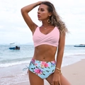 Detail of pink crossover bikini top and floral high-waisted bottoms on beach - S / Pink Floral