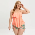 Close-up of coral pink tiered ruffles on a plus size tankini with tropical palm leaf prints - 2XL / Coral Pink Leaf