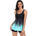 Detail of gradient tankini swimwear featuring asymmetric straps and black boyshorts set - S / Top And Bottom / Black and Green Gradient