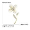 Elegante spilla a fiore dorata con petali in pietra occhio di gatto e zirconi - Oro (Articolo MM-BR-5148-GD)