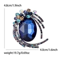 Modieuze broche met ovale blauwe glassteen en veelkleurige kristallen accenten - Blauw