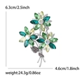 Eleganter Blumenstrauß Broche mit Smaragd-Strasssteinen und silberner Legierung - Grün