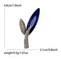 Elegant silver leaf brooch with a large deep blue faceted crystal and sparkling rhinestones - Blue