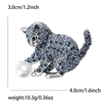 Detailed size view of a cat brooch with blue rhinestones and pearl, 3.0cm x 4.0cm dimensions - Blue
