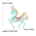 Mint green enamel carousel horse brooch with pink accents and gold plated alloy - Blue