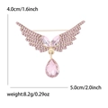Spilla ad ali d'angelo con cristalli rosa e pendente a goccia dorato, 5x4cm - Rosa