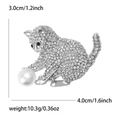Detail shot of cat brooch showing size 4.0cm x 3.0cm and weight 10.3g with rhinestones - Silver