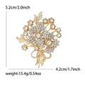 Elegant floral bouquet brooch with white rhinestones and gold base, 5.2cm x 4.2cm size - Gold-White
