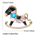 Spilla a forma di cavallo a dondolo in lega con cristalli colorati e smalto nero dorato - Oro KC - Nero
