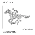 Detailed view of horse racing brooch with silver alloy and sparkling rhinestones - Silver