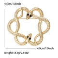 Broche serpent double dorée avec yeux en pierres noires, dimensions 4,9cm x 4,5cm - Doré