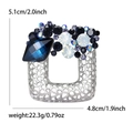 Silver hollow mesh square brooch with blue crystals and measurement details on white background - White K - Blue