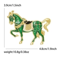 Elegant green enamel horse brooch pin with gold metal base and intricate carvings - Green