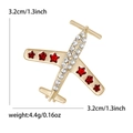 Elegant gold airplane brooch with crystals and red stars for suit and coat accessory - Gold with Red Stars