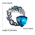 Spilla a ghirlanda blu con gemma a triangolo e cristalli sfumati blu e bianchi - Blu (5328-BL)