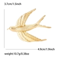 Spilla a forma di rondine in oro opaco per donna, altezza 3,7 cm e larghezza 4,9 cm - Oro Opaco