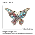 Detalle del broche de mariposa colorida 4,9x7,0 cm con circonitas y baño de oro de 14K - Oro Antiguo Multicolor