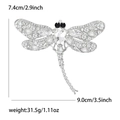 Detailed view of rhinestone dragonfly brooch with precise size and weight measurements - White K - White