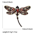 Detailed size chart of vintage dragonfly brooch featuring red rhinestones and gold metal - Antique Gold Purple
