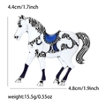 Detailed view showing a white enamel horse brooch with blue saddle and size dimensions - Antique Silver Hook White Horse (5479-WH) / White