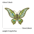 Broche de mariposa con diamantes verdes y azules con medidas 7,0cm ancho y 13,2g peso - Verde Oro Antiguo