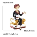 Elegant female teacher enamel brooch in gold finish with red beret and books design - Black