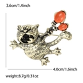 Vintage Katzenbrosche in Goldoptik mit orangefarbenen Steinen, 3,6 cm hoch, 4,0 cm breit - Gold