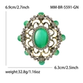 Vue détaillée d'une broche baroque avec cristal vert et mesures de dimensions - Or Antique-Vert (MM-BR-5591-GN)