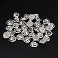 Detailed view of bulk silver metal butterfly clutch pin backs for brooches and badges - Silver