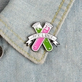 Creative chemistry test tube enamel brooch with pink and green liquid on denim jacket - Scientific Crossed Test Tubes Style (XZ2305)
