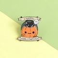Enamel Halloween brooch featuring a black cat in a pumpkin with Happy Halloween text - Black Cat Pumpkin Style (XZ2343)