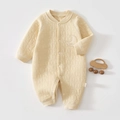 Detail of baby quilted romper showing moon and star textures with a Baby embroidery - Thermal Milk Yellow Star Moon Romper