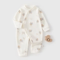 Baby-Strampler aus Baumwolle in Creme mit Bären-Print und praktischen Druckknöpfen - Größe 59 / Seitliche Öffnung Bär