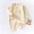 Quilted cotton long-sleeve baby romper in cream yellow with bear embroidery patch - Size 66 / Yellow