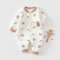 Macro detail of infant padded romper featuring hand-drawn bear patterns and ribbed cuffs - Thermal Coffee BABY Bear Romper