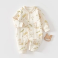 Flat lay of a quilted baby romper with rabbit prints and vertical texture on white base - Flower Rabbit