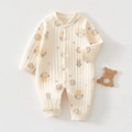 Detailed view of baby romper featuring soft cotton waffle fabric and cute cartoon bear print - Thermal Goodnight Bear Romper
