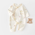Long-sleeved 100% cotton newborn romper in beige with circus tent and flag pattern - Carnival