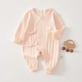 Detail of pink cotton baby jumpsuit with side ties and soft ribbed texture fabric - Size 66 / Pink (Wing)